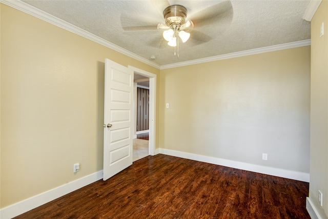 spare room with a textured ceiling, dark hardwood / wood-style flooring, and ceiling fan