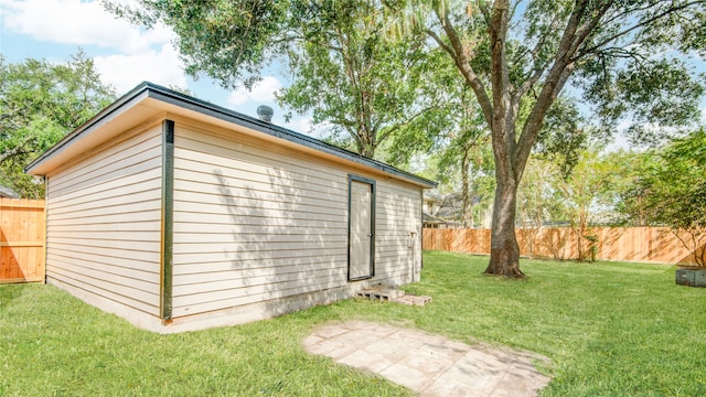 view of outdoor structure with a yard