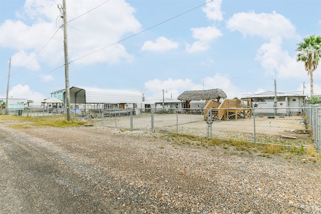 view of yard with a carport