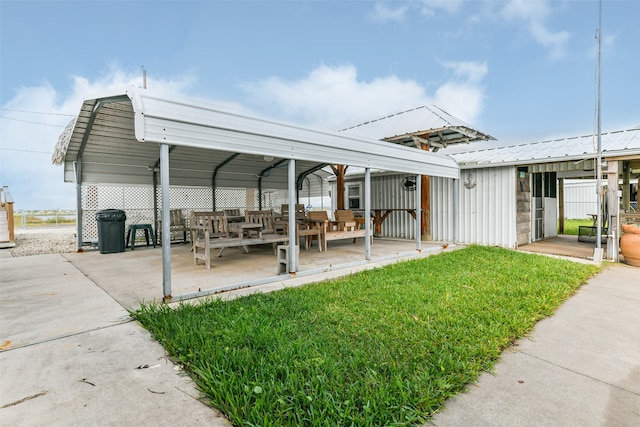 exterior space with a carport