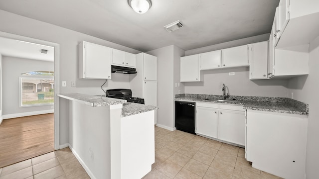 kitchen featuring sink, black appliances, light stone counters, white cabinets, and light wood-type flooring