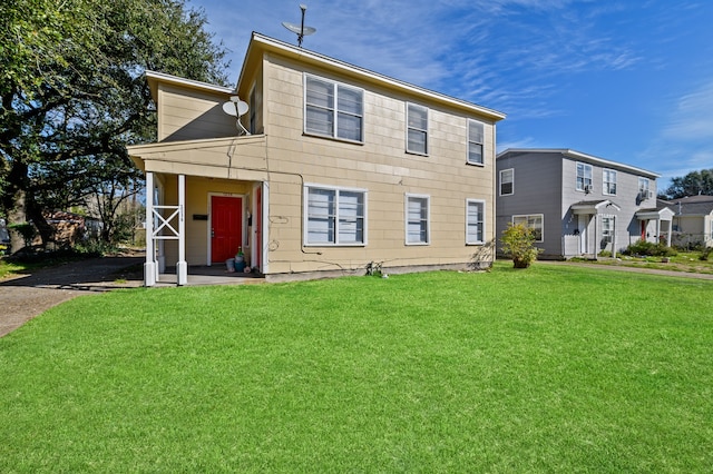 view of front of property featuring a front yard