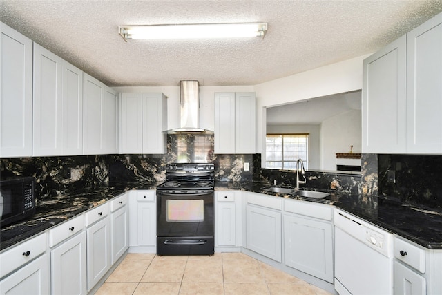 kitchen featuring black appliances, sink, wall chimney exhaust hood, and a textured ceiling