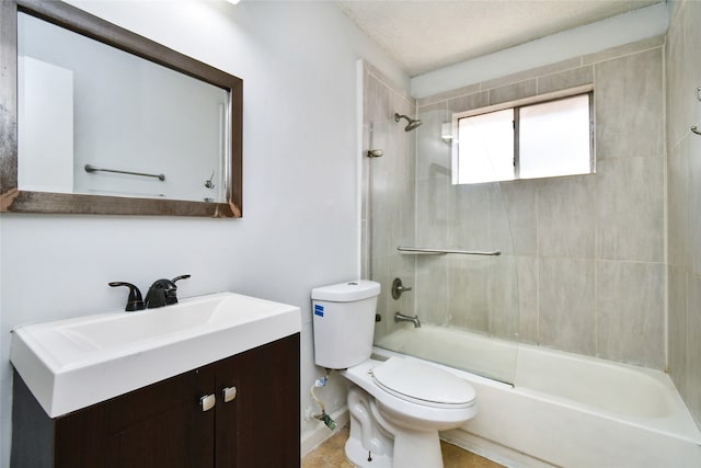 full bathroom featuring vanity, toilet, and tiled shower / bath combo