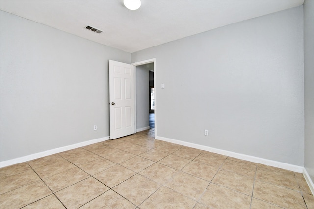 view of tiled spare room