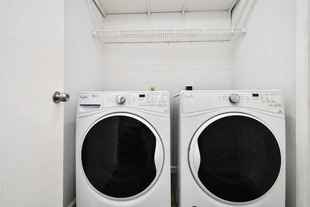 laundry room with washer and clothes dryer