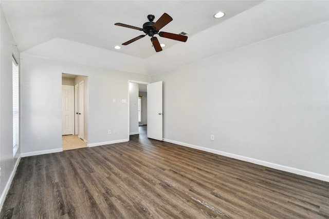 unfurnished bedroom with dark hardwood / wood-style flooring and ceiling fan