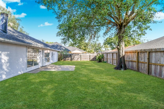 view of yard with a patio area