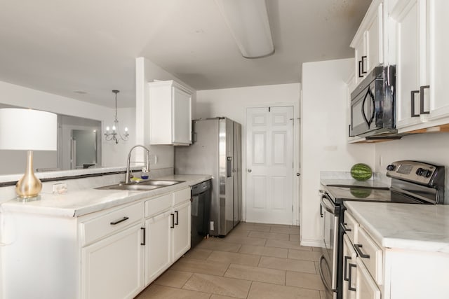 kitchen featuring white cabinetry, sink, black appliances, hanging light fixtures, and a chandelier