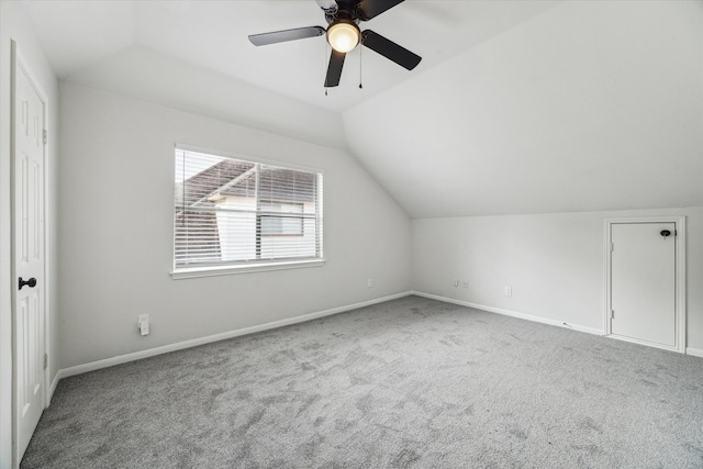 bonus room featuring ceiling fan, carpet flooring, and lofted ceiling