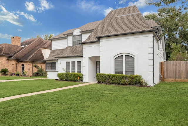 view of front of home with a front lawn