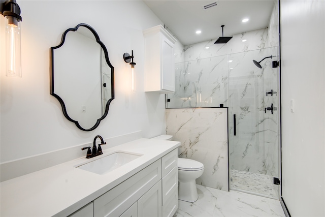 bathroom with walk in shower, vanity, and toilet