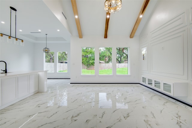 spare room with high vaulted ceiling, beamed ceiling, a healthy amount of sunlight, and a chandelier