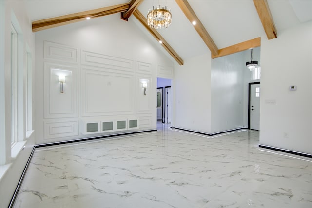 interior space featuring high vaulted ceiling, a chandelier, and beam ceiling