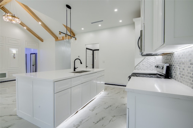 kitchen with sink, decorative light fixtures, an island with sink, and electric stove