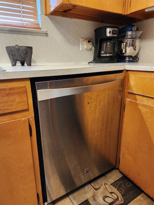 interior space featuring stainless steel dishwasher