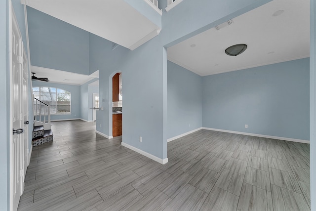 empty room featuring ceiling fan