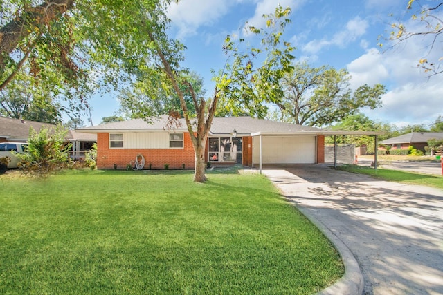 ranch-style home with a front yard, a garage, and a carport