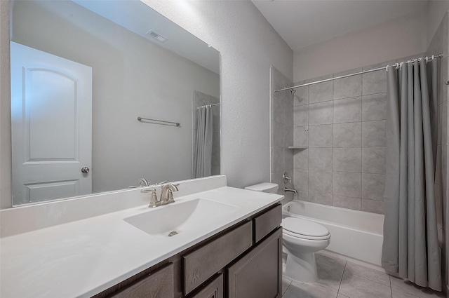 full bathroom with tile patterned flooring, vanity, toilet, and shower / bathtub combination with curtain