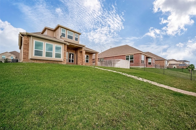 view of front of home with a front lawn