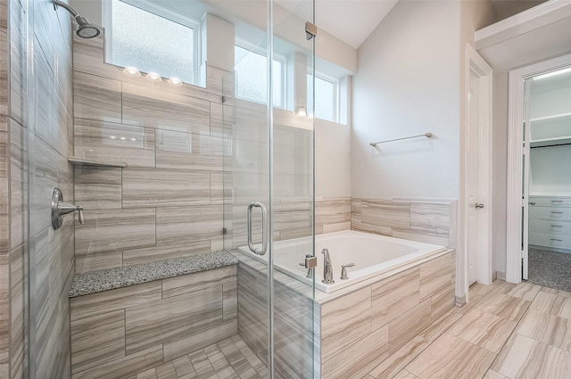 bathroom with independent shower and bath