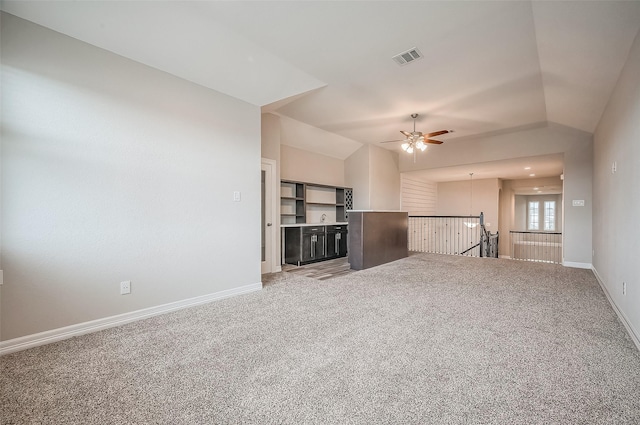 unfurnished living room with carpet, ceiling fan, and lofted ceiling