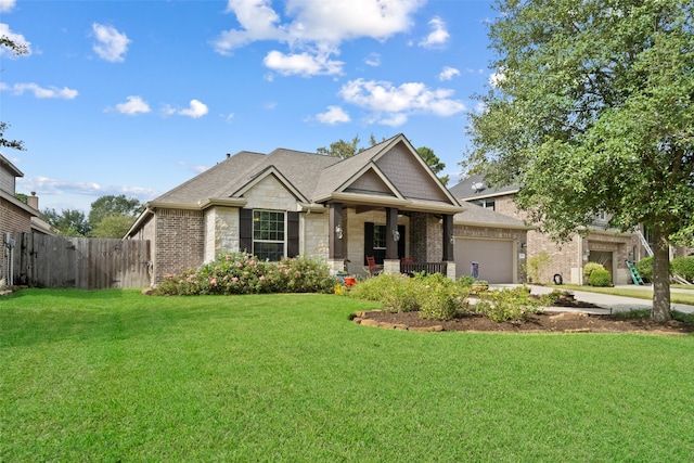 view of front facade featuring a garage and a front lawn