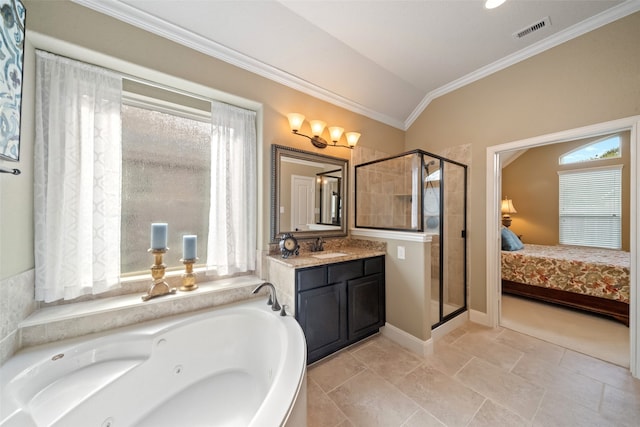 bathroom with a wealth of natural light, lofted ceiling, crown molding, and separate shower and tub