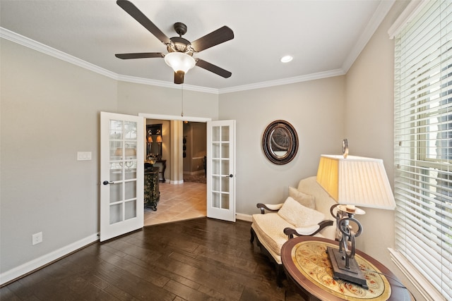 unfurnished room with french doors, dark hardwood / wood-style floors, crown molding, and ceiling fan