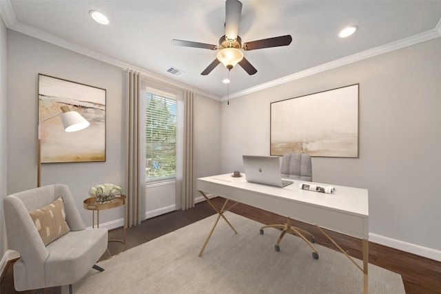 office with dark wood-style floors, visible vents, ornamental molding, ceiling fan, and baseboards