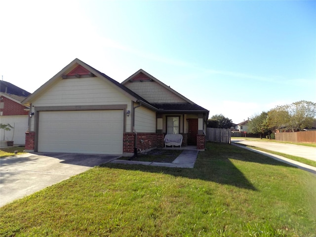 view of front of home featuring a front lawn and a garage