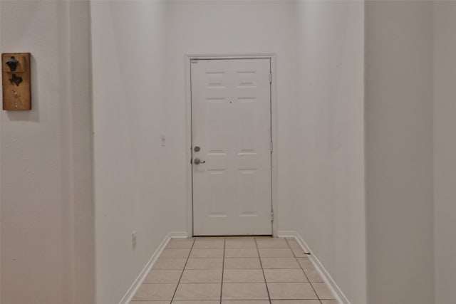 entryway featuring light tile patterned flooring