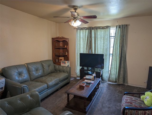 carpeted living room with ceiling fan