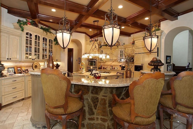 23 Villeroy Way, The Woodlands, TX 77382 - bar area featuring arched walkways, stone tile floors, decorative backsplash, coffered ceiling, and beam ceiling