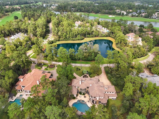 23 Villeroy Way, The Woodlands, TX 77382 - aerial view of property and surrounding area featuring a nearby body of water, a tree filled landscape, a pool, a golf club, and nearby suburban area
