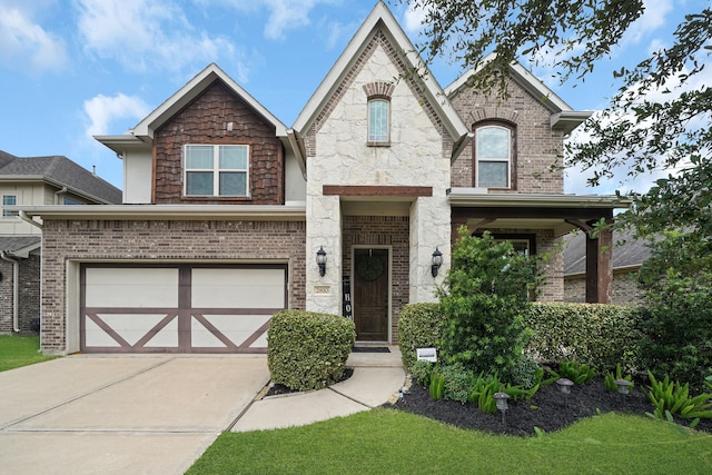 view of front of property with a garage