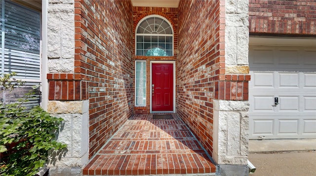 entrance to property featuring a garage