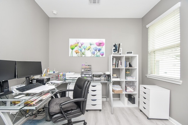 home office featuring light wood-type flooring