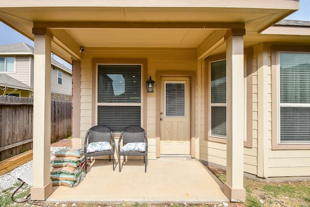 property entrance featuring a patio area