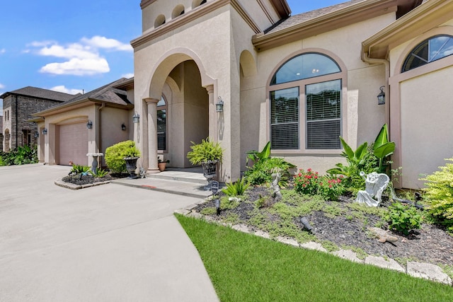 property entrance with a garage