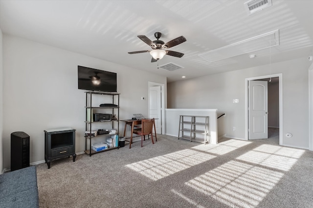 interior space featuring ceiling fan and carpet flooring