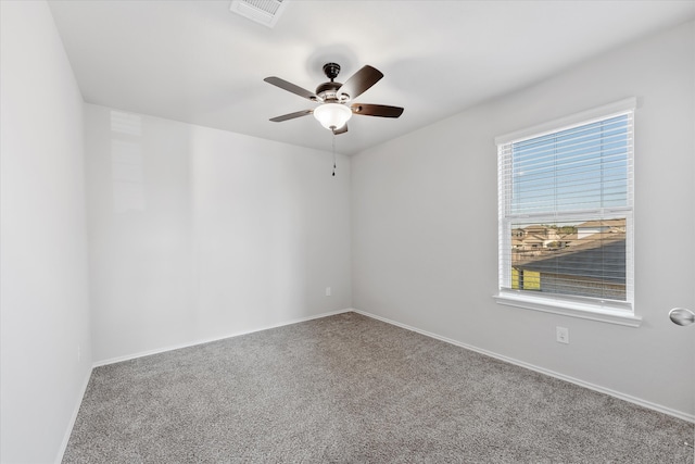 carpeted empty room with ceiling fan