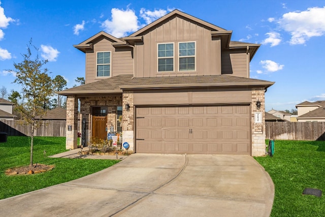 craftsman inspired home with a garage and a front lawn