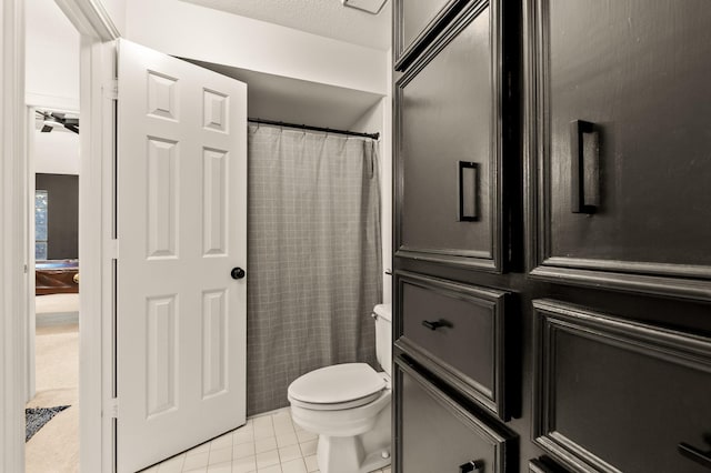 15007 Terrace Oaks Dr, Houston, TX 77068 - bathroom with tile patterned floors and toilet
