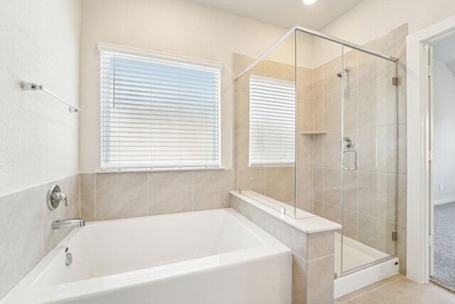 bathroom with independent shower and bath