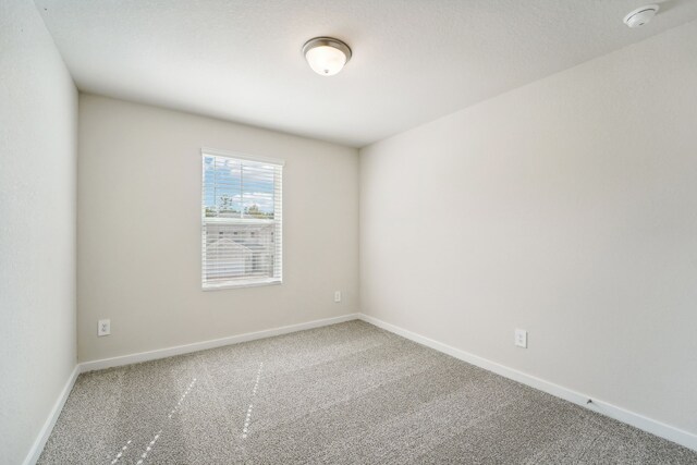 empty room with carpet floors