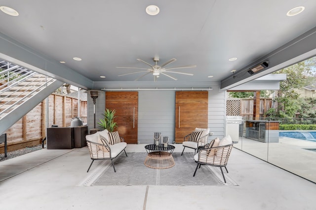 view of patio featuring a grill, an outdoor hangout area, and ceiling fan