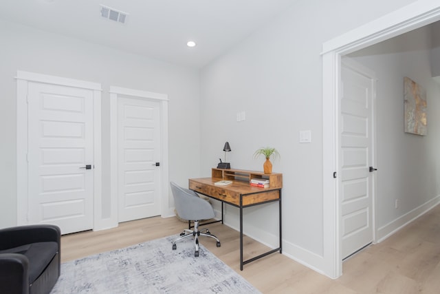 home office featuring light wood-type flooring