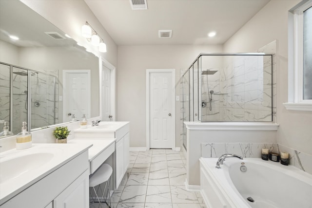 bathroom featuring vanity and separate shower and tub