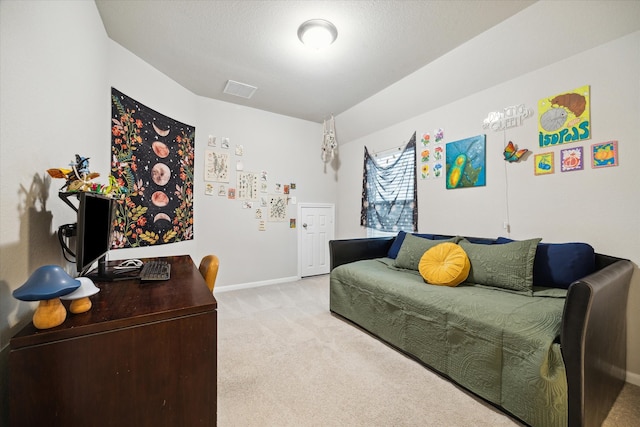 bedroom featuring light carpet